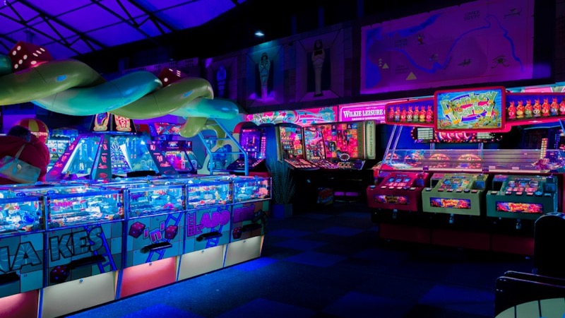 Custom arcade cabinet set up at a special event venue
