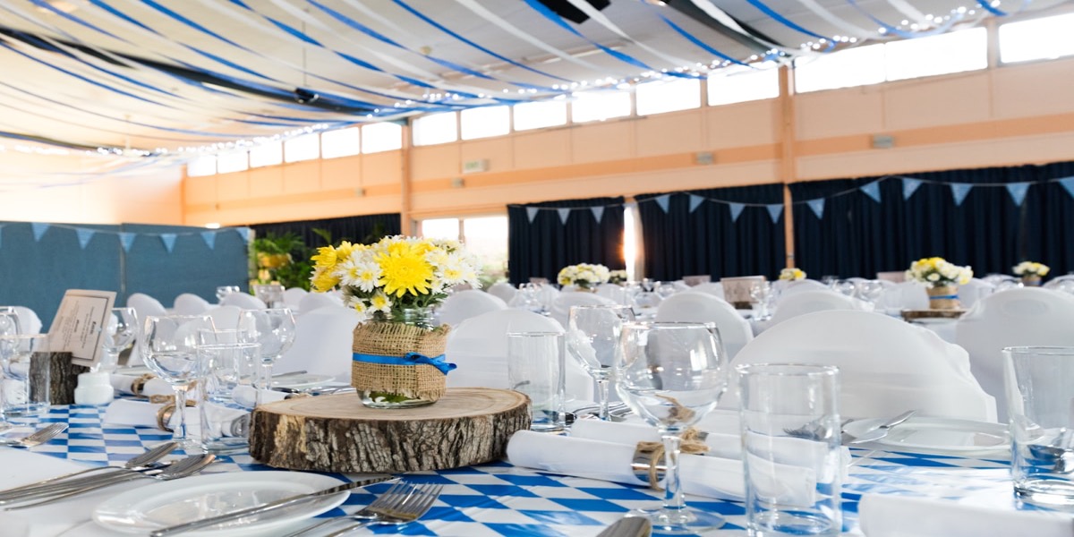Modern wedding entertainment setup with arcade games
